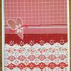 For this card I used my lacy edge-punch on five pieces of patterned paper and four solid white papers. I alternated layers on the bottom half of the card, added a piece of ribbon halfway up, topped it off with a sticker, and voilà! Instant Valentine!
